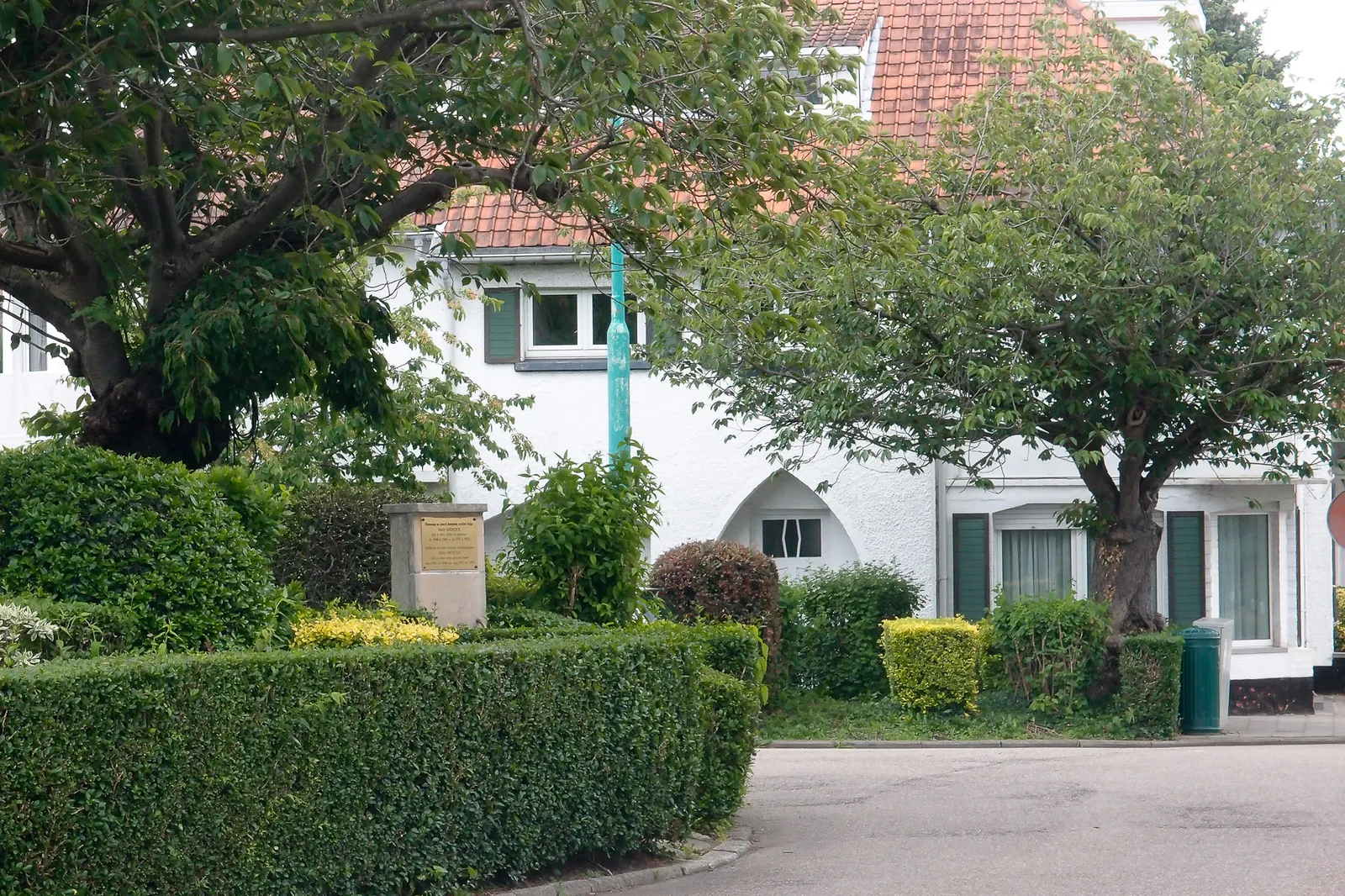 Det hvide hus hvor familien Merckx havde deres købmandsforretning. Place des Bouvreuils i Woluwe-Saint-Pierre